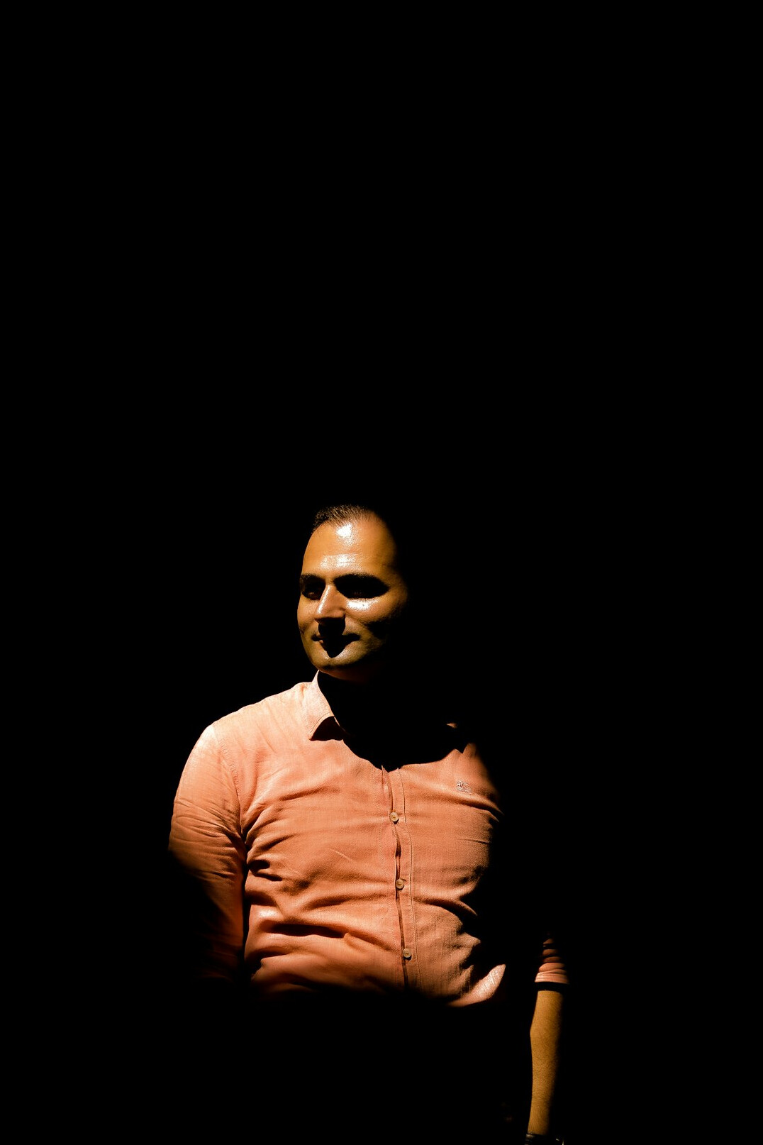 Studio portrait of a middle-aged man film director