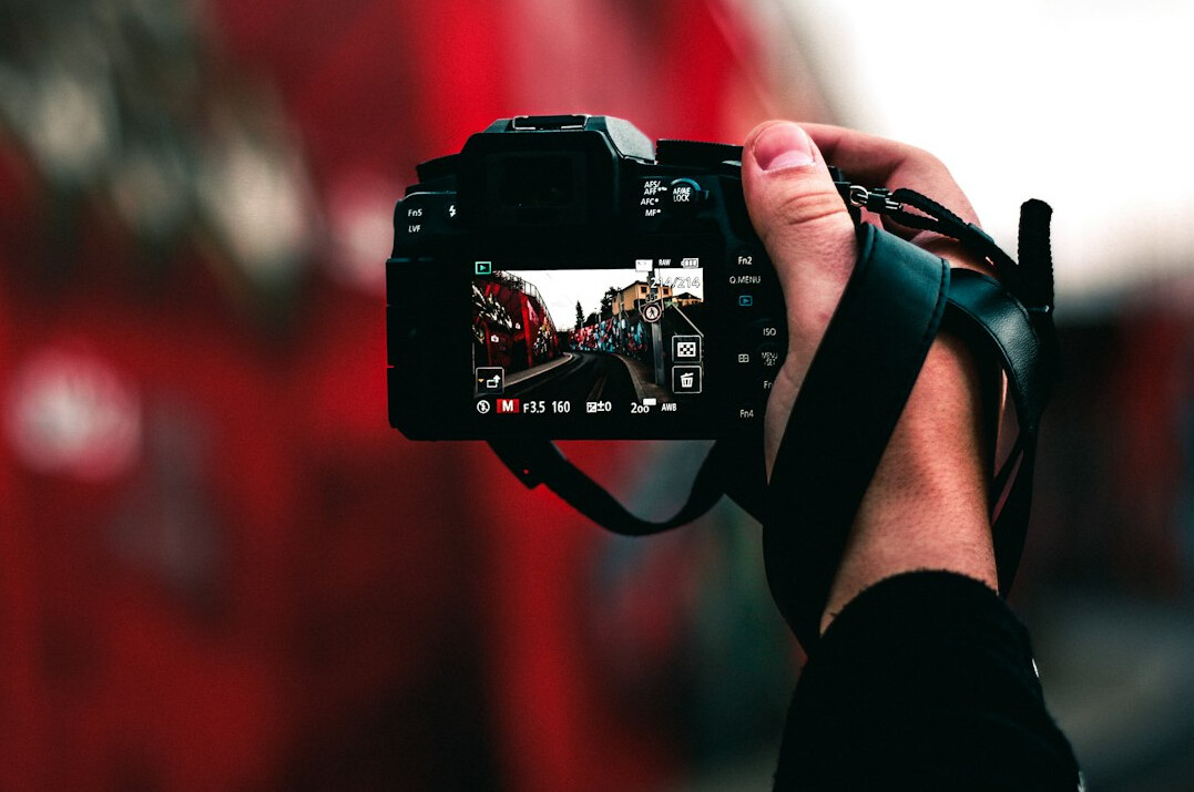 beginner holding camera