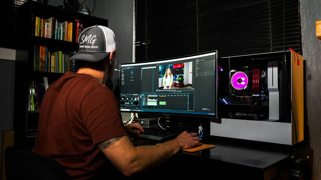 filmmaker editing video on computer
