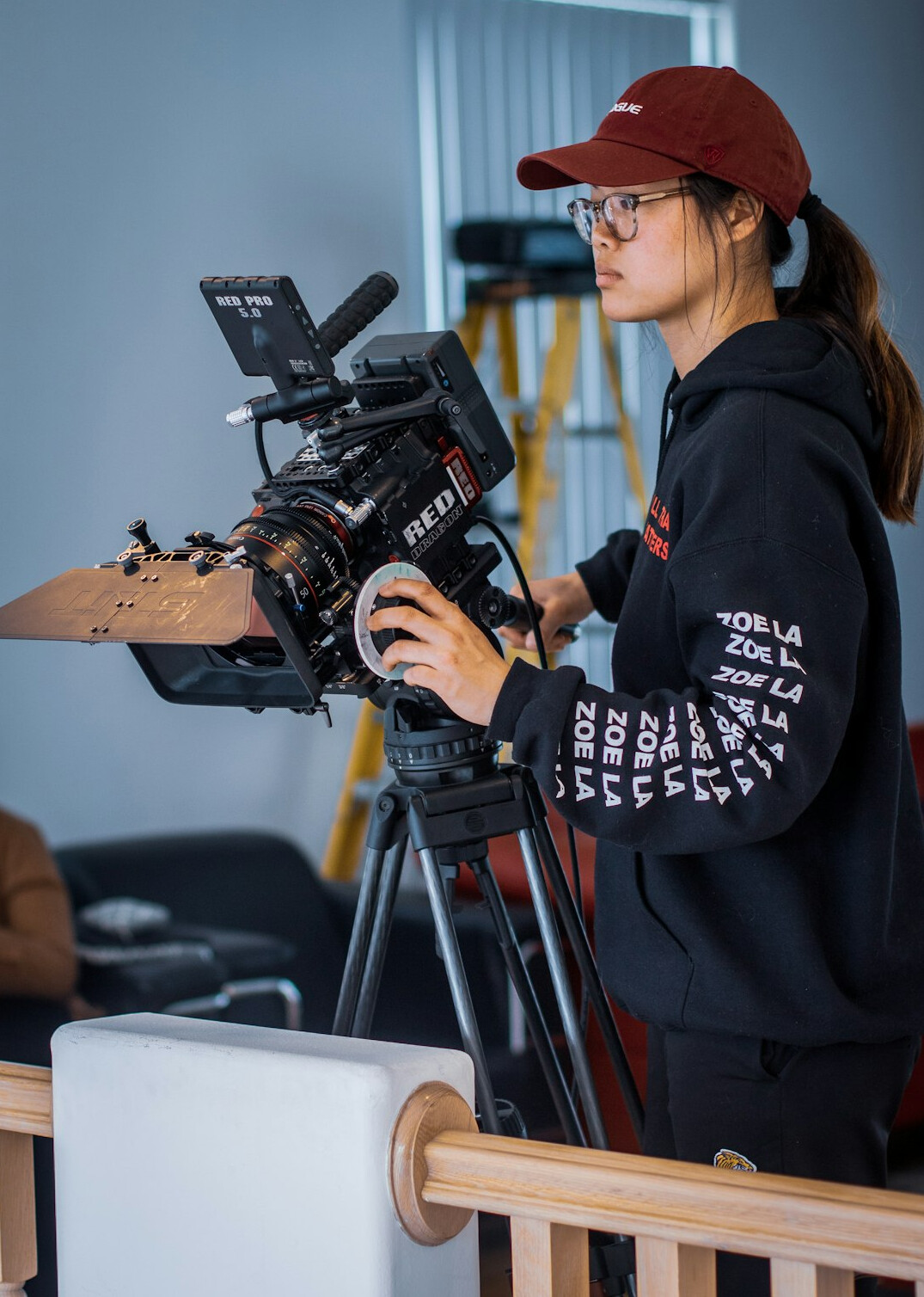 cinematographer adjusting lights